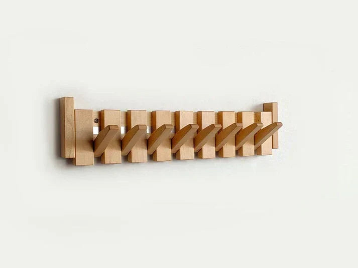 Organisez votre entrée avec ce porte-manteau mural en bois design piano, à la fois esthétique et pratique.
