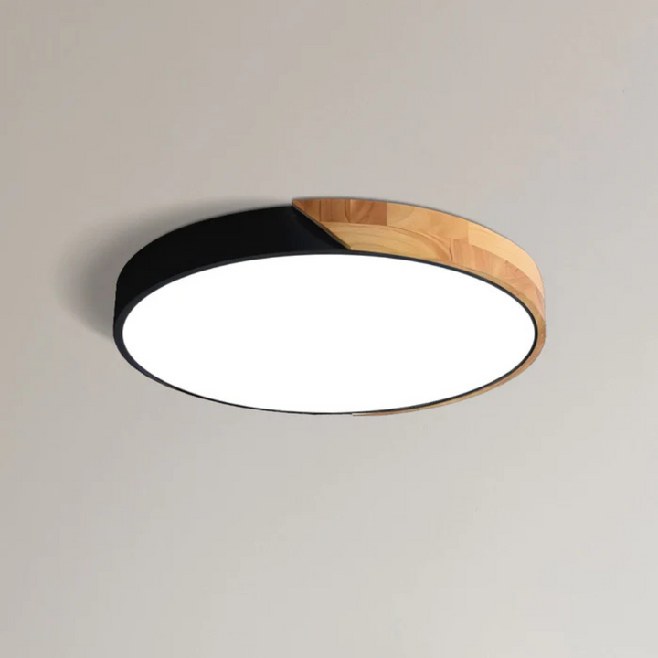 Plafonnier LED scandinave en bois, design moderne pour un éclairage intérieur chaleureux et stylé.