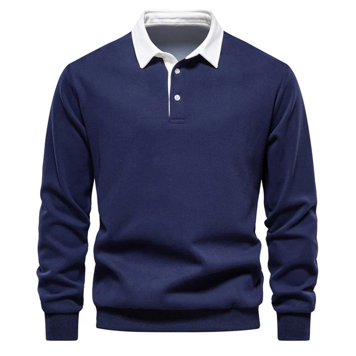 Polo rugby homme bleu marine, manches longues, style sportif élégant. Mode masculine décontractée automne/hiver.