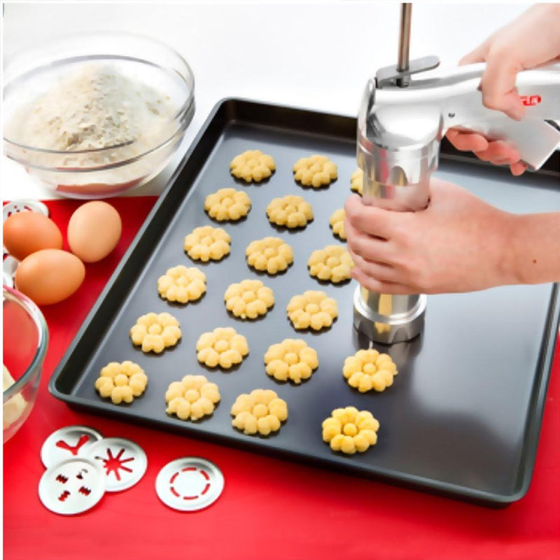 Presse à biscuits en inox et ABS, ustensile de cuisine pour des biscuits faits maison et gourmands.