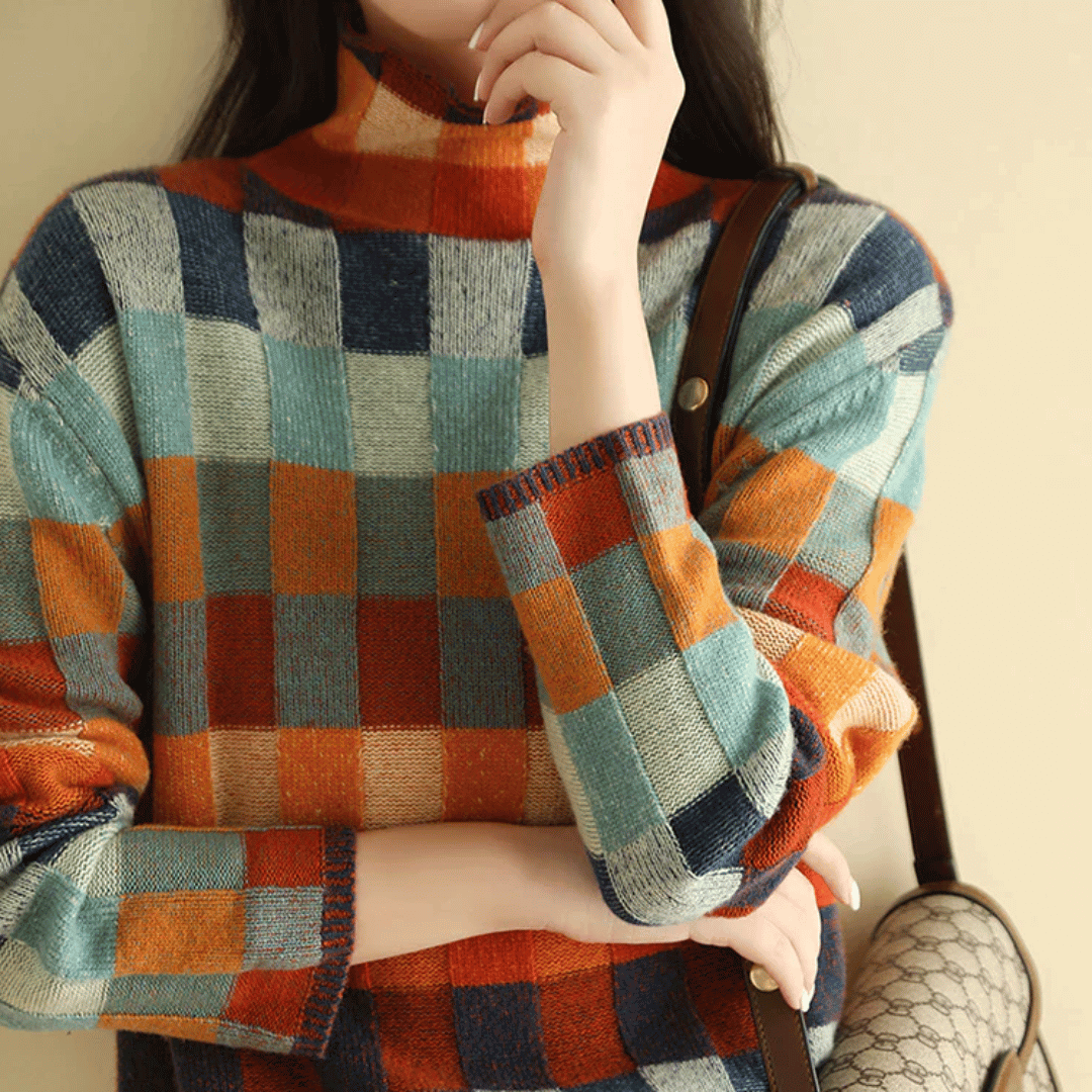 Pull d'hiver femme, col roulé orange et design patchwork unique. Parfait pour rester au chaud avec style.