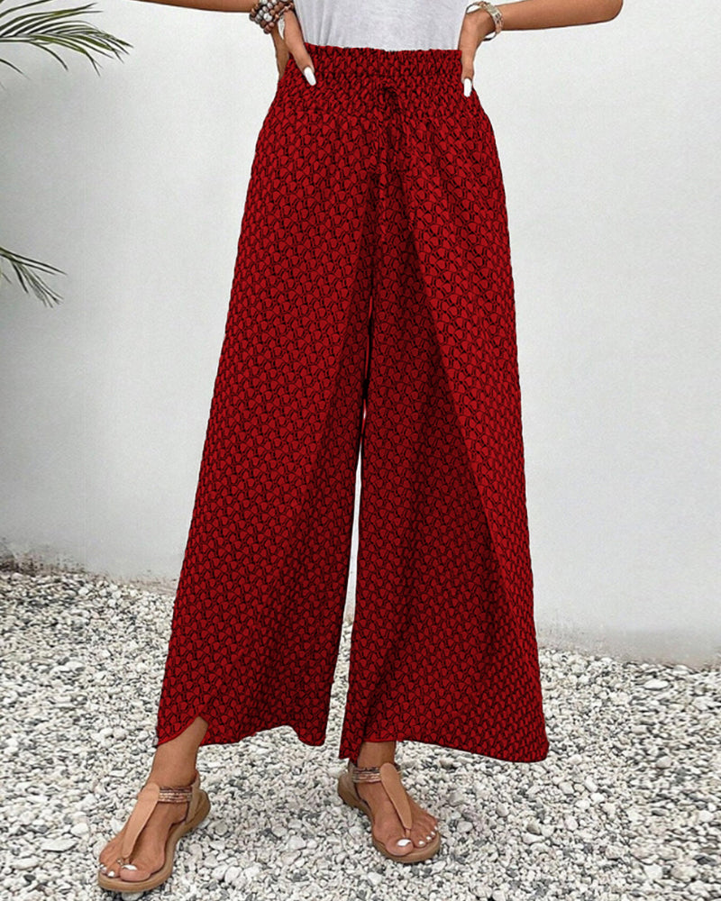 Pantalon femme à taille haute flatteuse et jambes larges fluides, tendance moderne.