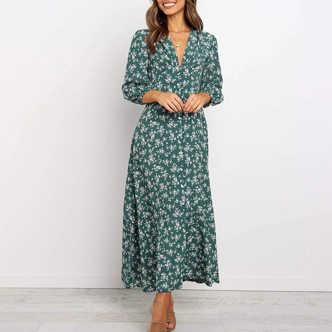 Robe longue fluide fleurie pour femme, imprimé chic. Manches longues et col V élégants, parfaite pour toute occasion.