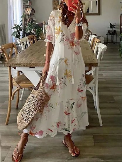 Robe midi femme, imprimé géométrique original, manches lanternes, coupe fluide, look décontracté.