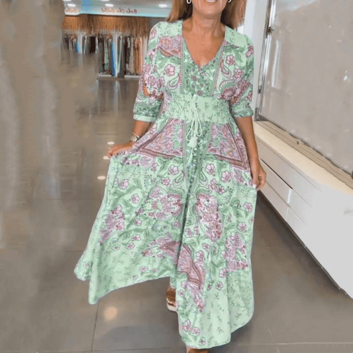 Robe midi confortable avec col V et cordon, mode femme printemps-été, très fluide.