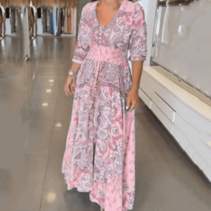 Élégante robe midi imprimée florale, idéale pour les tenues de printemps et d'été.