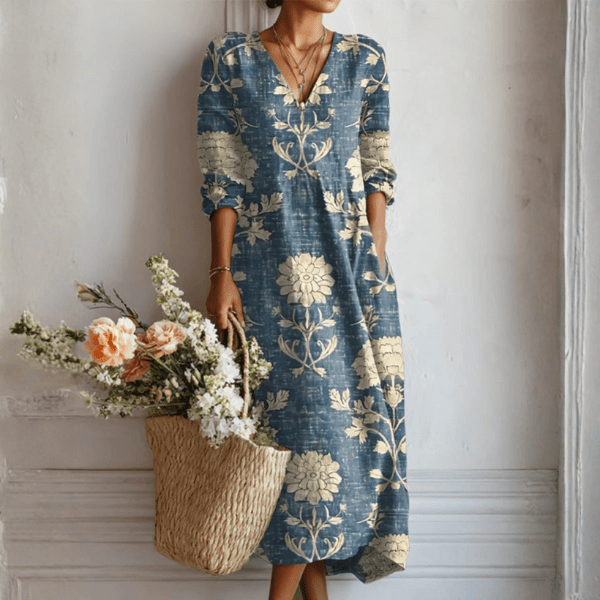 Robe longue fluide imprimée pour femme, col V et manches longues. Élégance décontractée, confort chic.