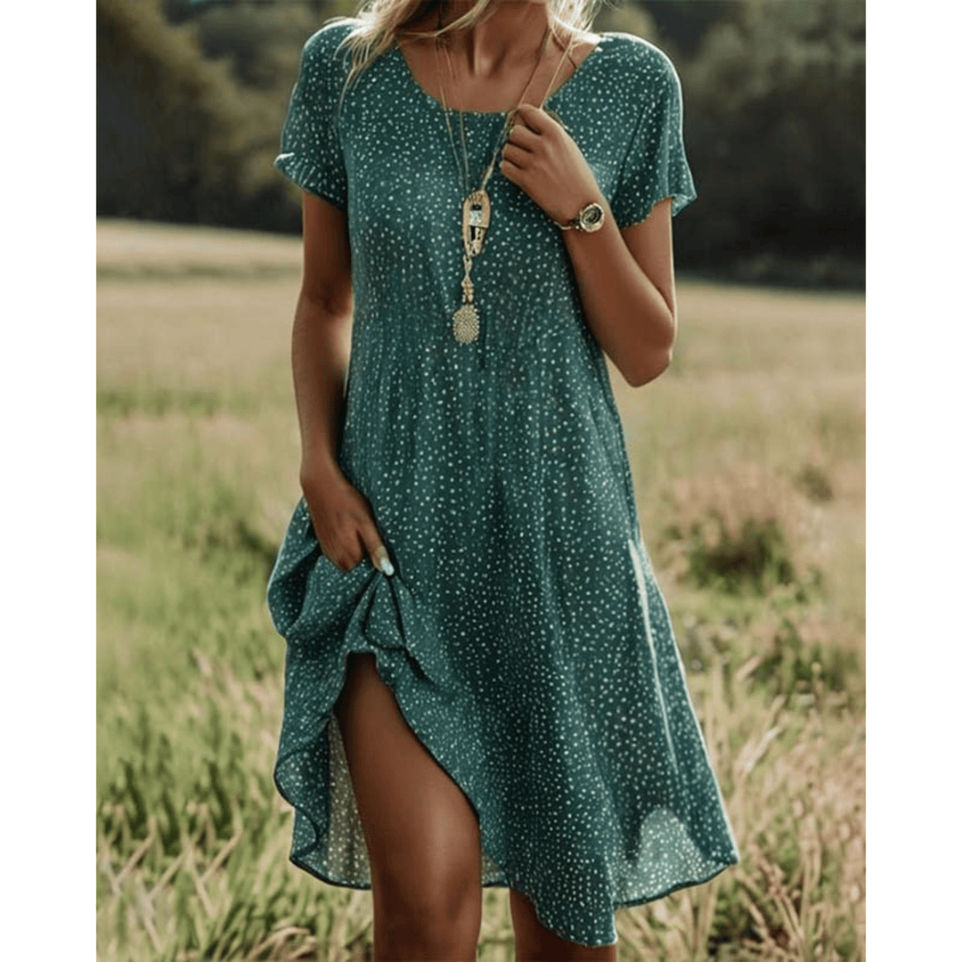 Robe mi-longue imprimée verte pour femme, élégante et confortable, idéale pour l'été. Style décontracté tendance.