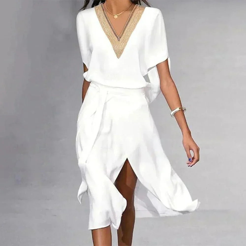 Robe midi femme à col V en dentelle, élégante et chic. Parfaite pour une tenue polyvalente ou occasion spéciale.