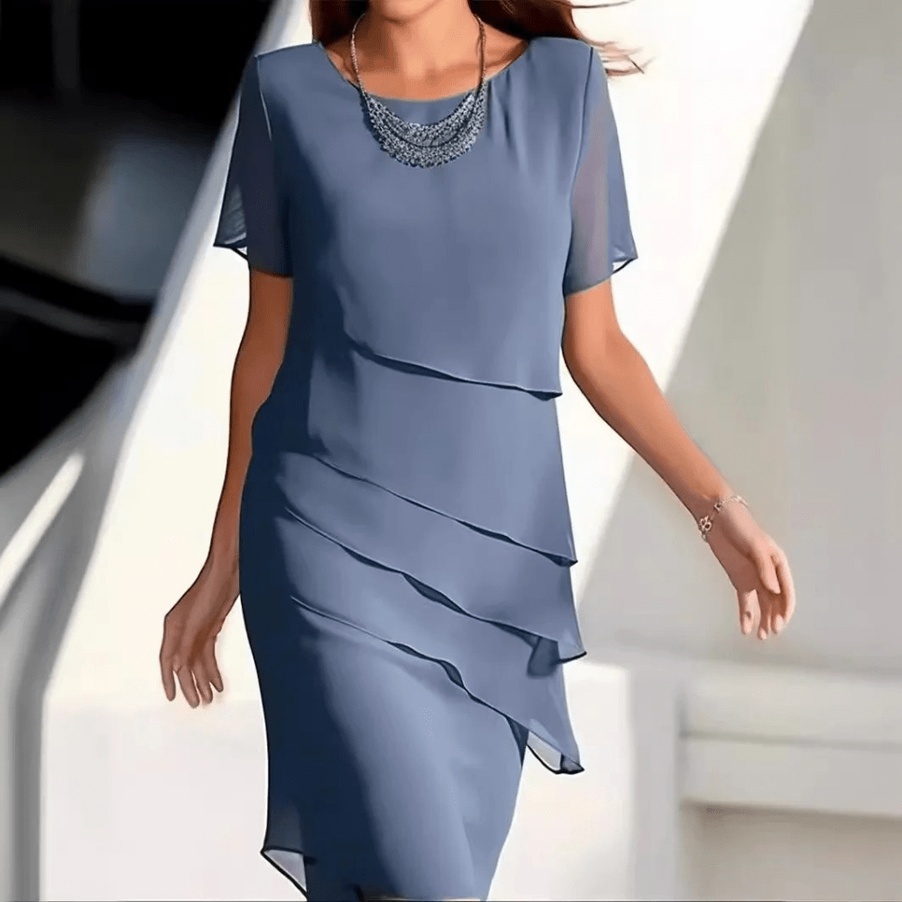 Robe midi couleur pour femme, coupe trapèze flatteuse et tissu doux, idéale pour le confort et le style.