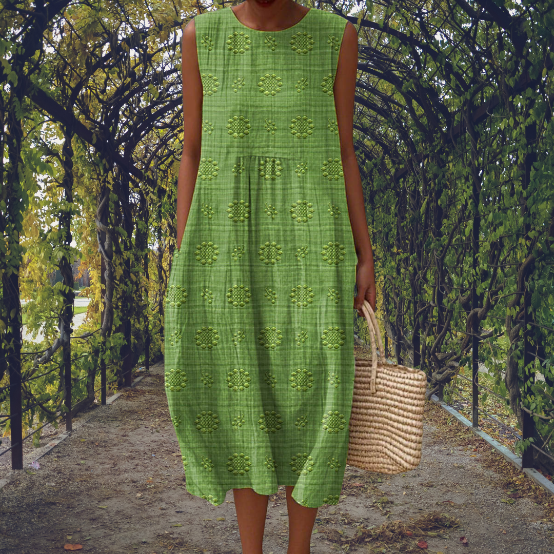 Robe midi trapèze sans manches femme, style bohème chic. Parfaite pour un confort décontracté d'été.