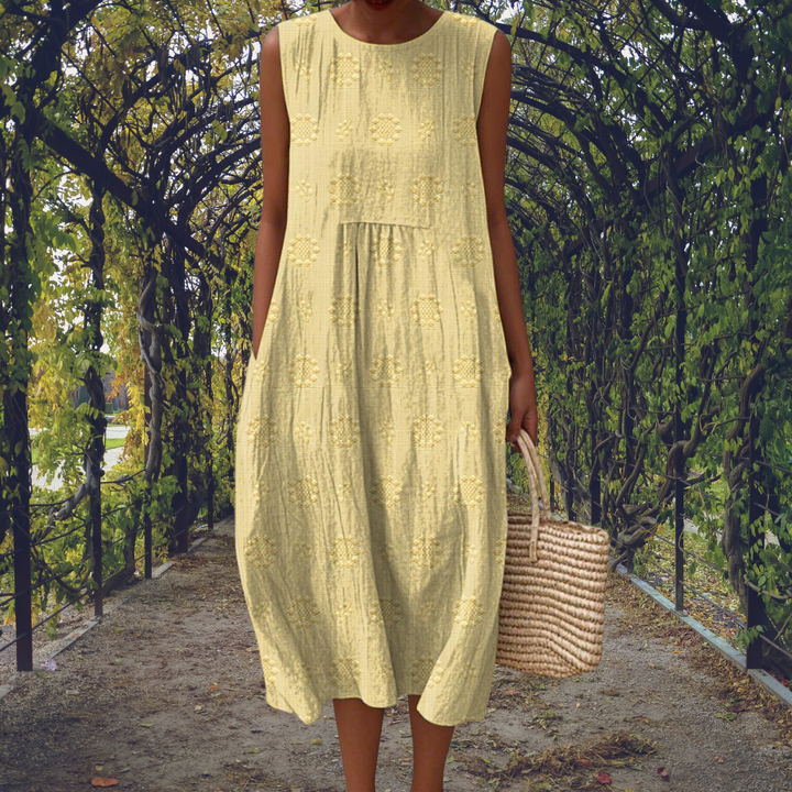Robe femme midi, coupe trapèze élégante et confortable, sans manches, style bohème chic pour toutes occasions.