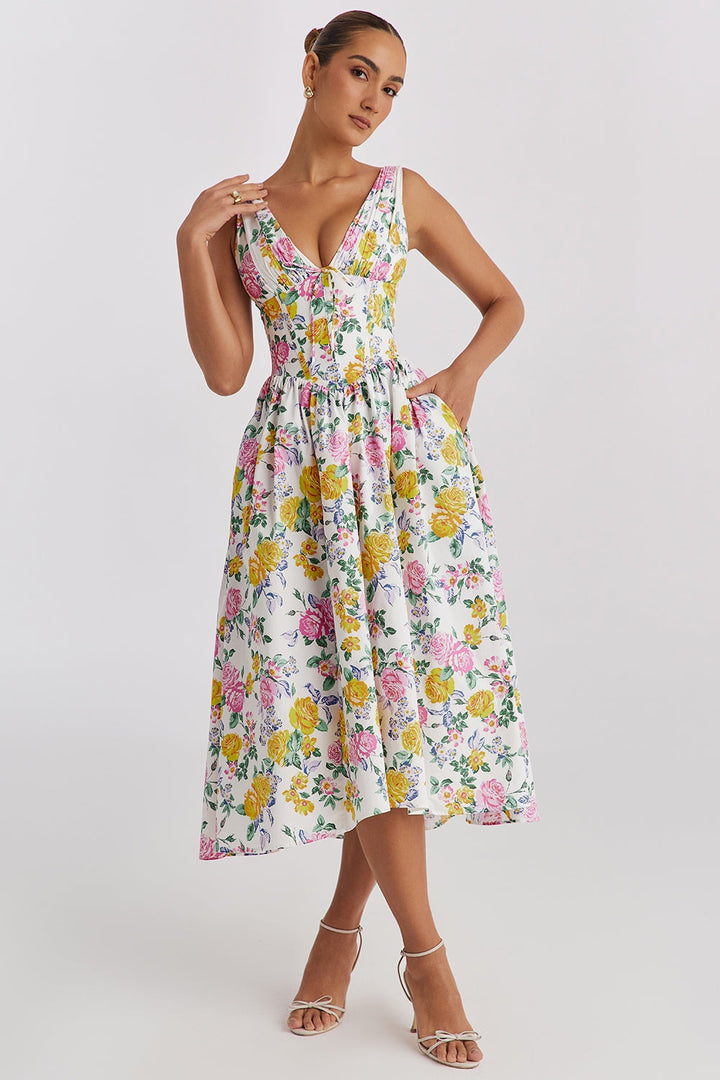 Robe midi trapèze fleurie sans manches pour femme, élégante et confortable pour l'été.