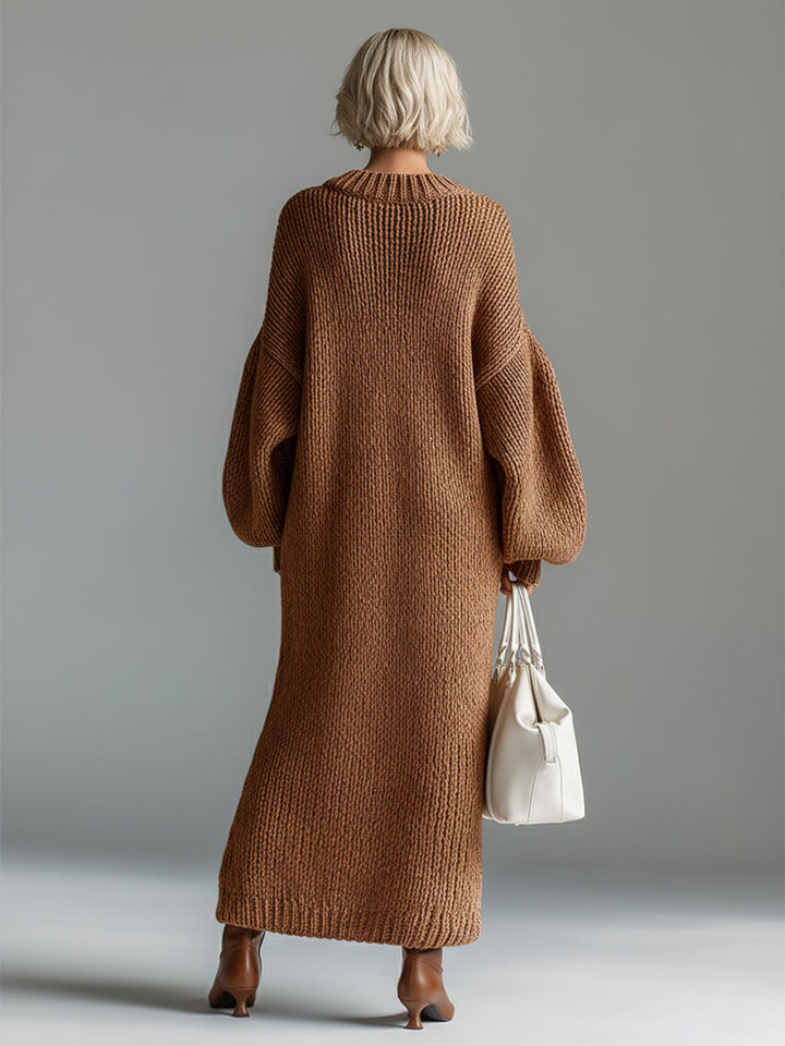 Robe pull oversize femme, chaude et confortable, pour un style hivernal polyvalent et chic.