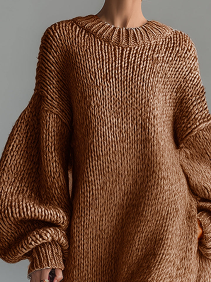 Robe pull confortable femme, style oversize élégant, manches ballon tendance, pour l'hiver.