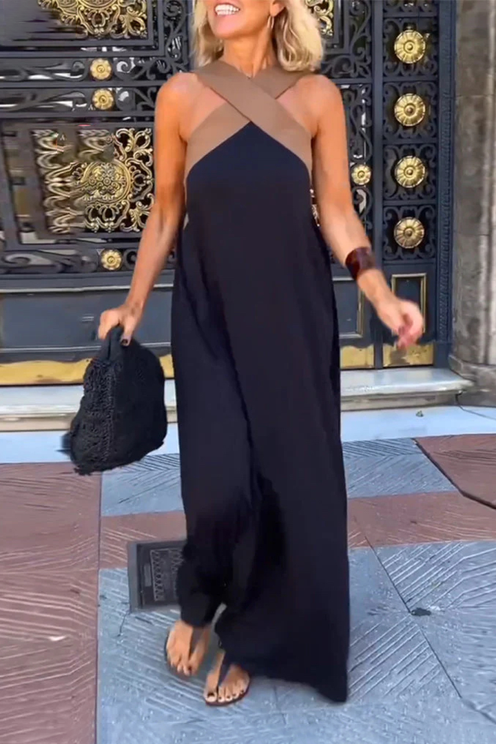 Robe femme élégante sans manches, encolure américaine croisée, parfaite pour soirée ou tenue chic.
