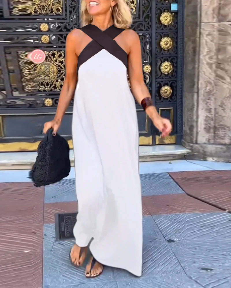 Robe sans manches femme polyvalente, style décontracté ou soirée, avec encolure américaine et croisée.