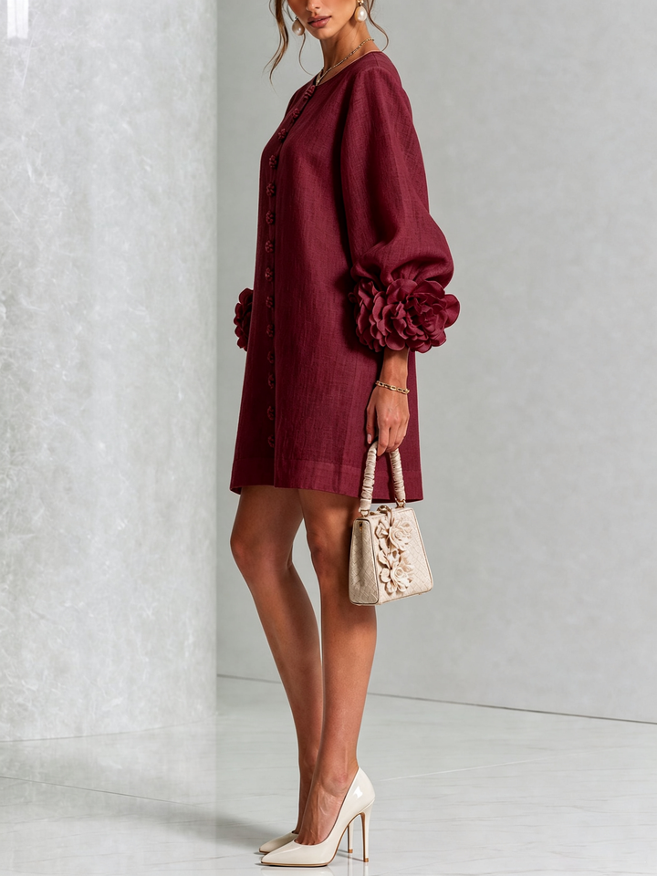 Robe trapèze rose, boutonnée, effet lin, manches 3/4, élégance décontractée pour femme.