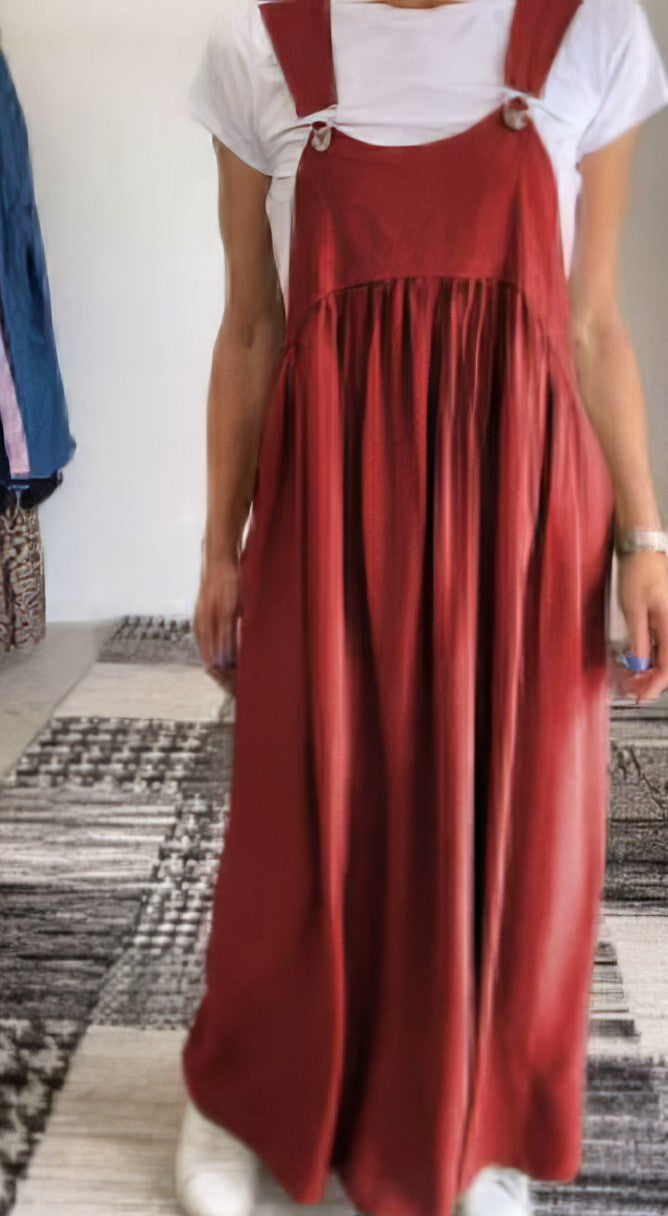 Robe maxi noire style salopette chic, coupe fluide et confortable, idéale pour le printemps.