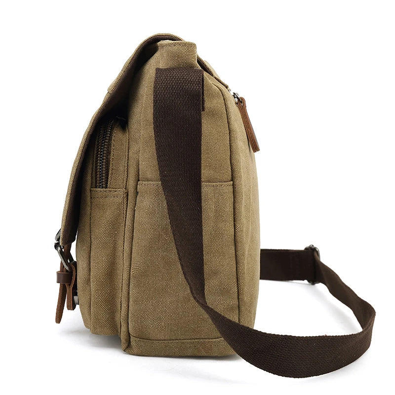Sac de voyage homme en toile marron, bandoulière ajustable et robuste, grande capacité pour l'aventure.