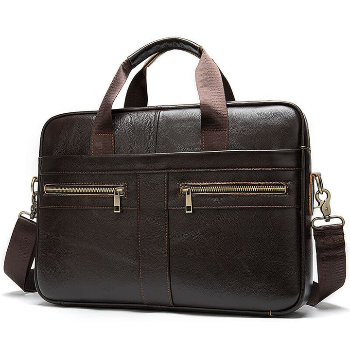 Gros plan sur la fermeture éclair solide et les coutures du sac professionnel homme en cuir vegan.