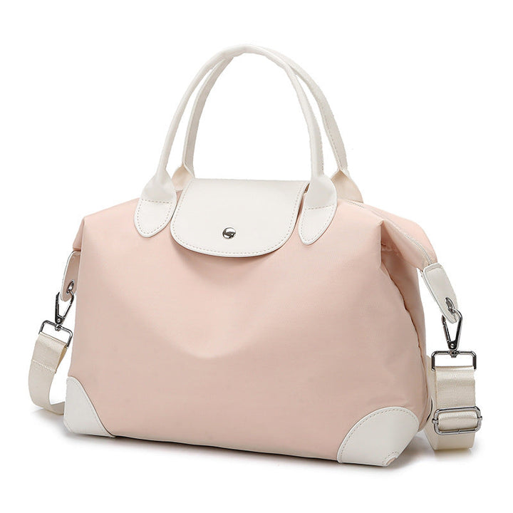 Sac cabas élégant femme, coloris tendance, grand et pratique pour le quotidien.