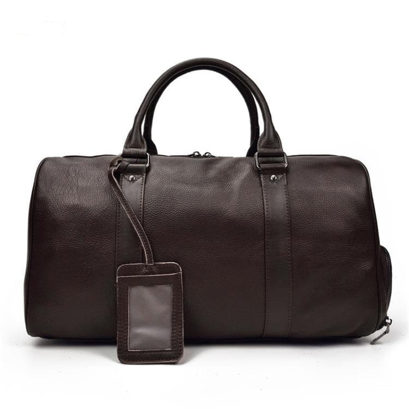 Duffle bag en cuir de haute qualité pour femme, idéal pour les voyages avec style et confort.