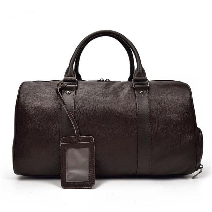 Duffle bag en cuir de haute qualité pour femme, idéal pour les voyages avec style et confort.