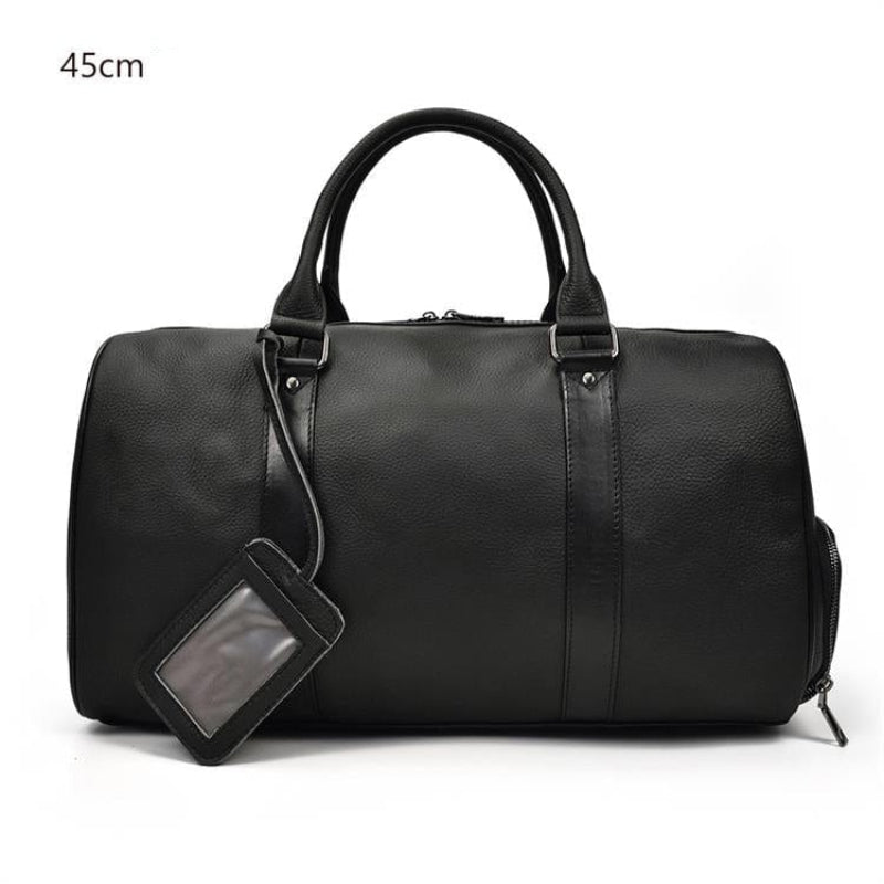 Sac de voyage en cuir noir, élégant et robuste pour femme. Un accessoire indispensable pour l'aventure.