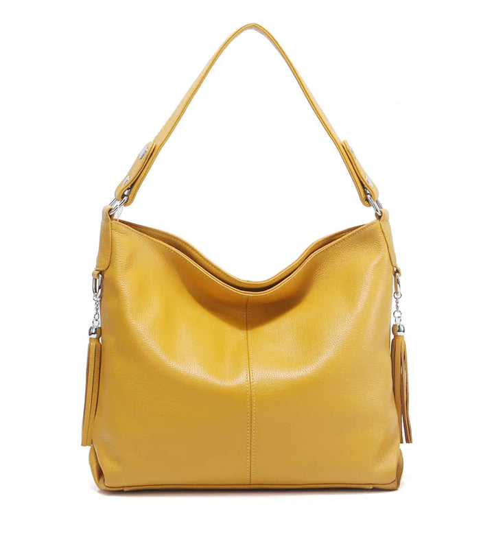 Sac bandoulière pour femme, grand et organisé, en cuir synthétique durable et stylé.