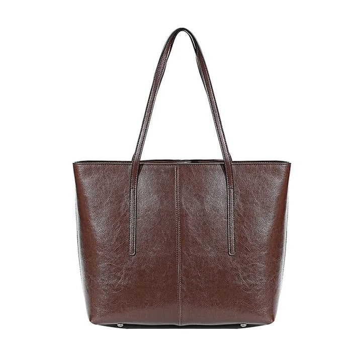 Sac cabas ordinateur femme en cuir véritable, élégant et moderne pour le travail.