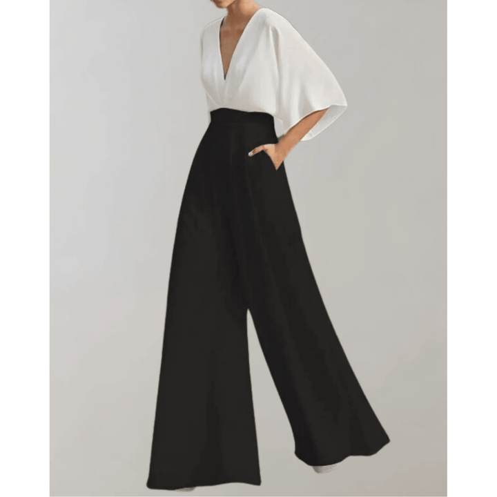 Tenue femme élégante: salopette chic taille haute à jambes larges. Combinaison fluide et confortable, style moderne.