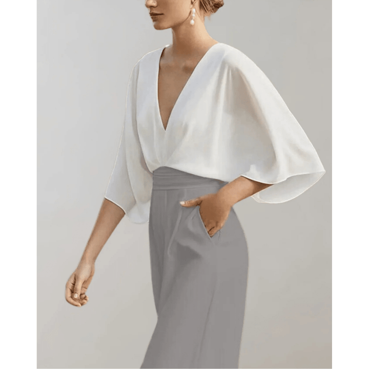 Combinaison femme taille haute confortable, jambes larges. Tenue chic et polyvalente, parfaite pour le style moderne.