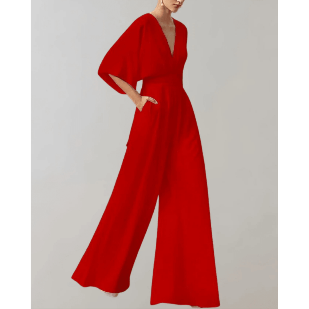 Salopette femme élégante à jambes larges et taille haute. Parfaite pour une soirée ou un événement chic et stylé.