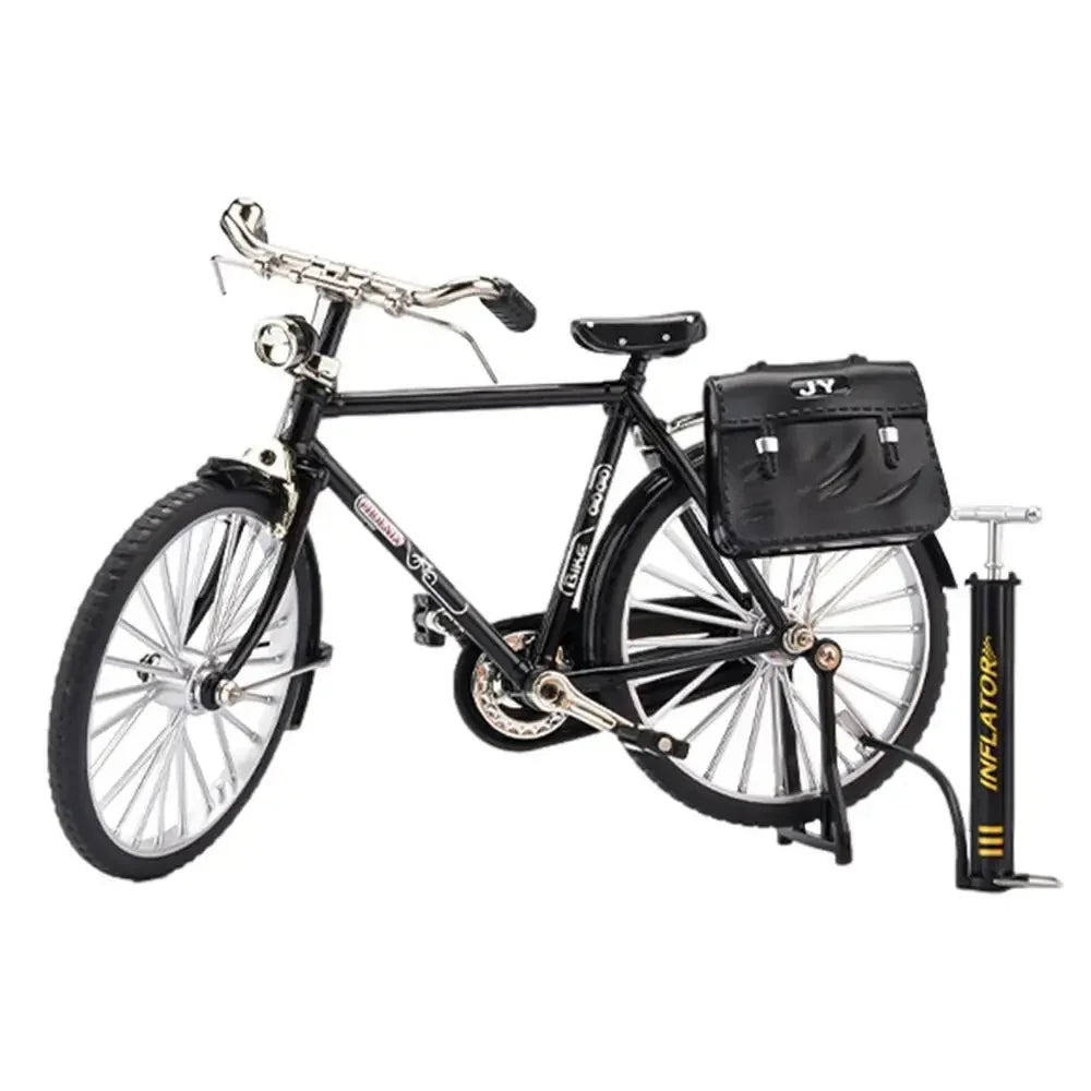 Assemblez ce vélo miniature en métal et plastique. Kit de construction ludique pour hobby créatif ou cadeau.