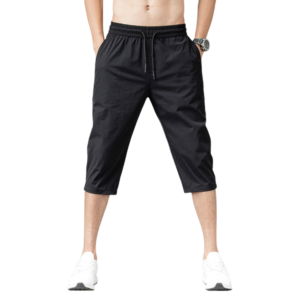 Short de bain long extensible pour homme, séchage rapide, idéal plage et natation estivale.