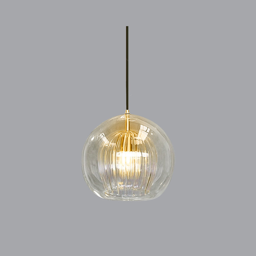 Éclairage suspendu LED en verre moderne pour cuisine ou salle à manger contemporaine.