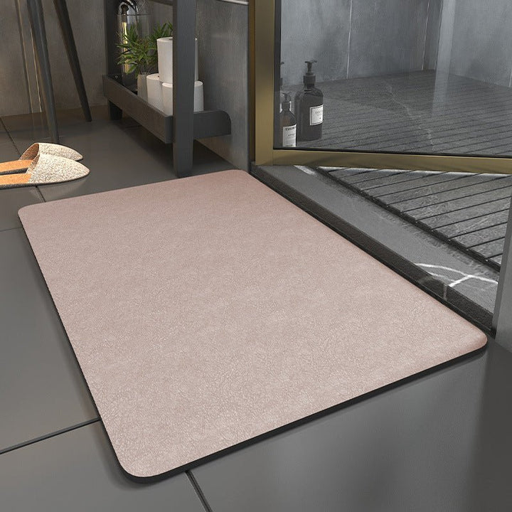 Tapis de bain confortable, ultra-absorbant et antidérapant pour une salle de bain sèche et sécurisée au quotidien.