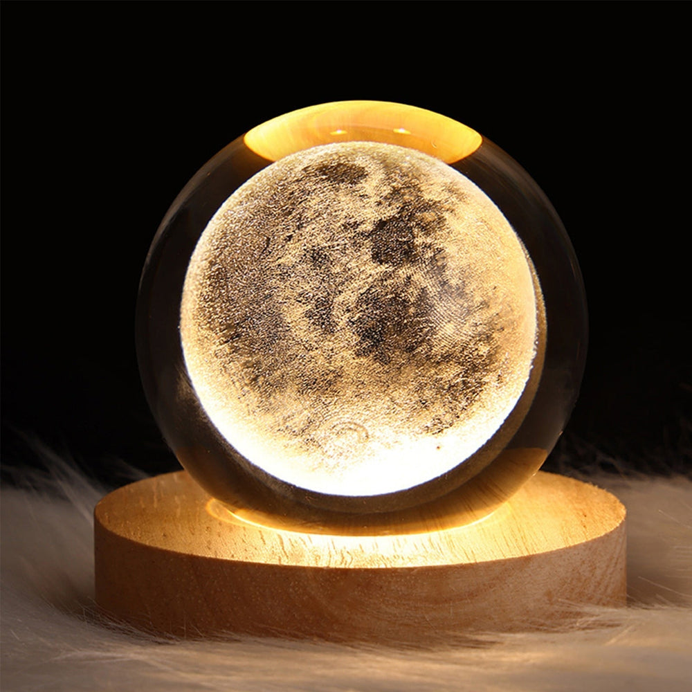 Sphère lumineuse en cristal planète, lampe LED USB créant une ambiance cosmique de sérénité pour la maison.