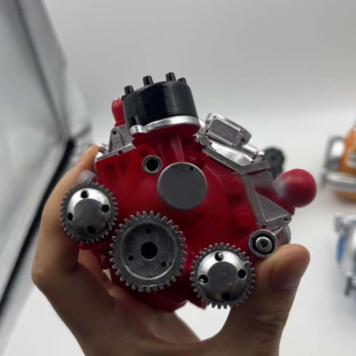 Ingénierie automobile miniature : kit moteur V8 essence fonctionnel à assembler, explorez la mécanique interne.