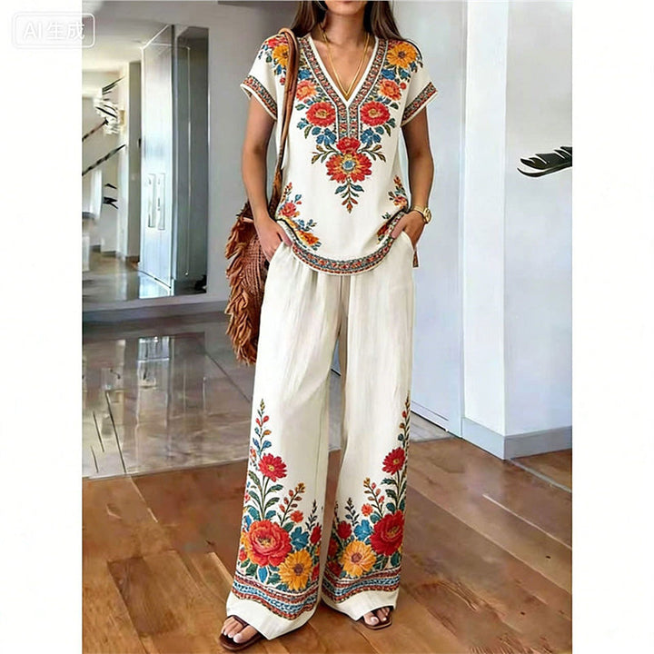 Ensemble printemps fluide : haut floral bohème avec col V et pantalon large, parfait pour femme.