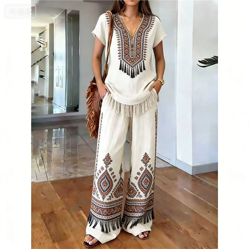 Vêtements féminins : ensemble bohème floral, haut chic et pantalon large fluide pour un été stylé.