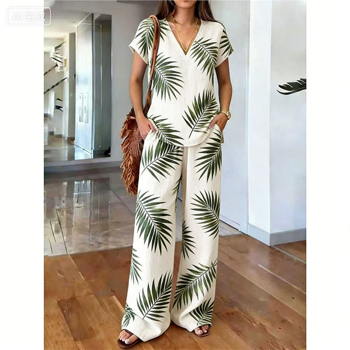 Ensemble femme confortable : haut floral fluide et pantalon large bohème pour un look estival chic.