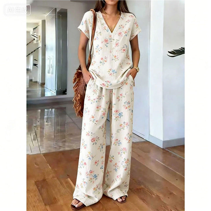 Préparez l'été avec cet ensemble bohème : haut floral et pantalon large fluide, une mode intemporelle.