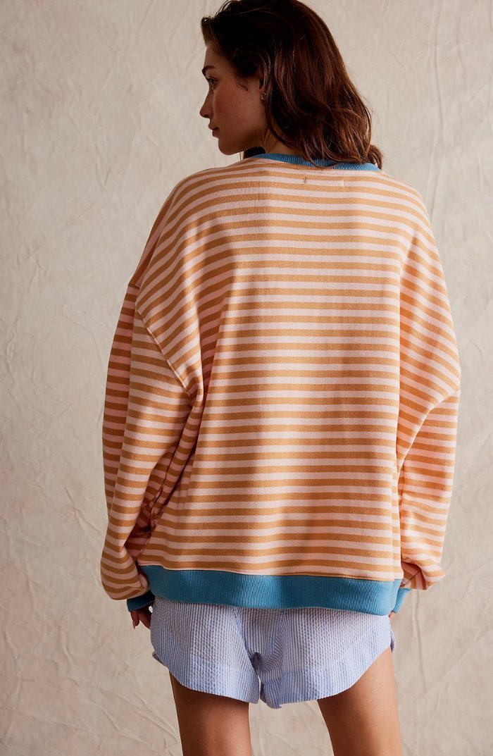 Sweat-shirt femme rayé, confortable et décontracté, avec bord contrasté, idéal pour le quotidien.