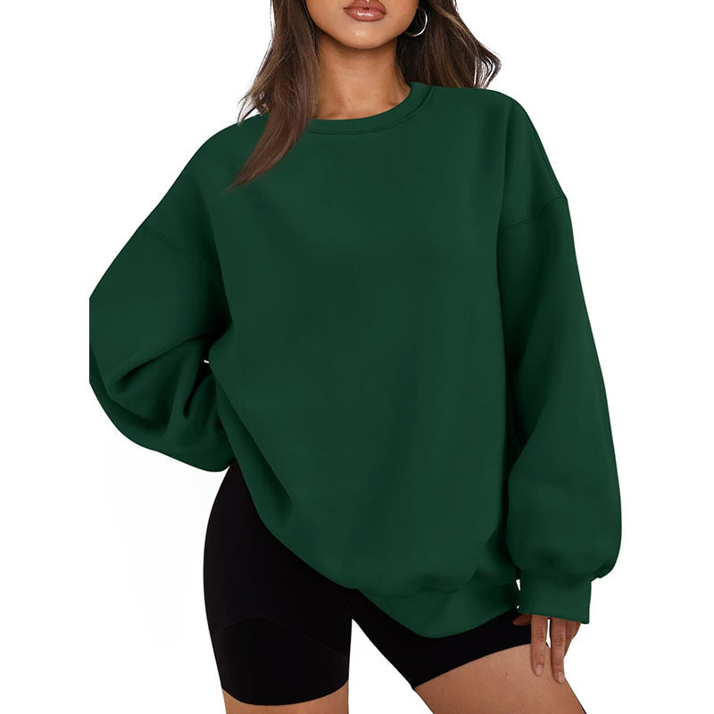Sweat-shirt oversize femme basique, couleur unie, pour une tenue décontractée.