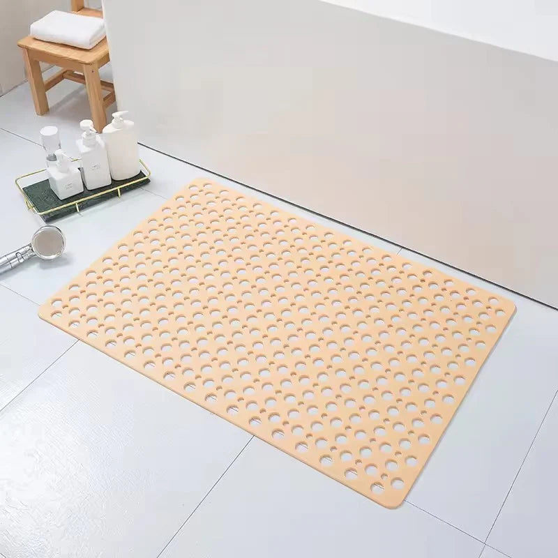 Tapis de douche drainant pour un confort optimal et une hygiène parfaite. Antidérapant, idéal pour toute salle de bain moderne.