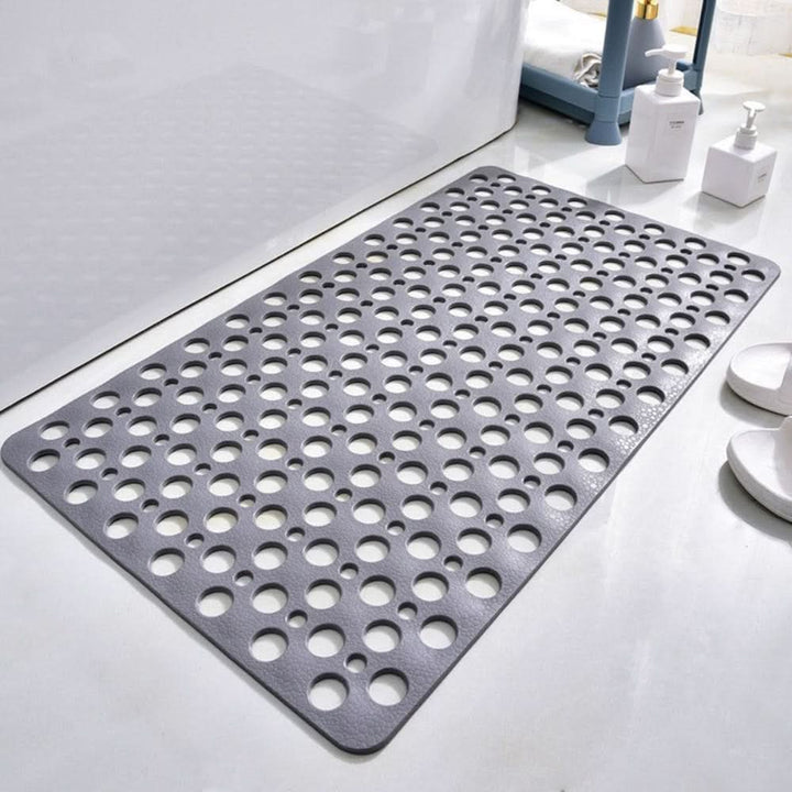 Tapis de douche antidérapant gris avec ventouses, sécurise la salle de bain et offre un grand confort.