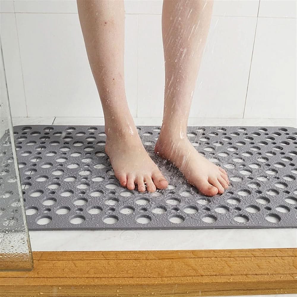 Accessoire de bain essentiel : tapis de douche antidérapant, confortable et sûr, avec ventouses.