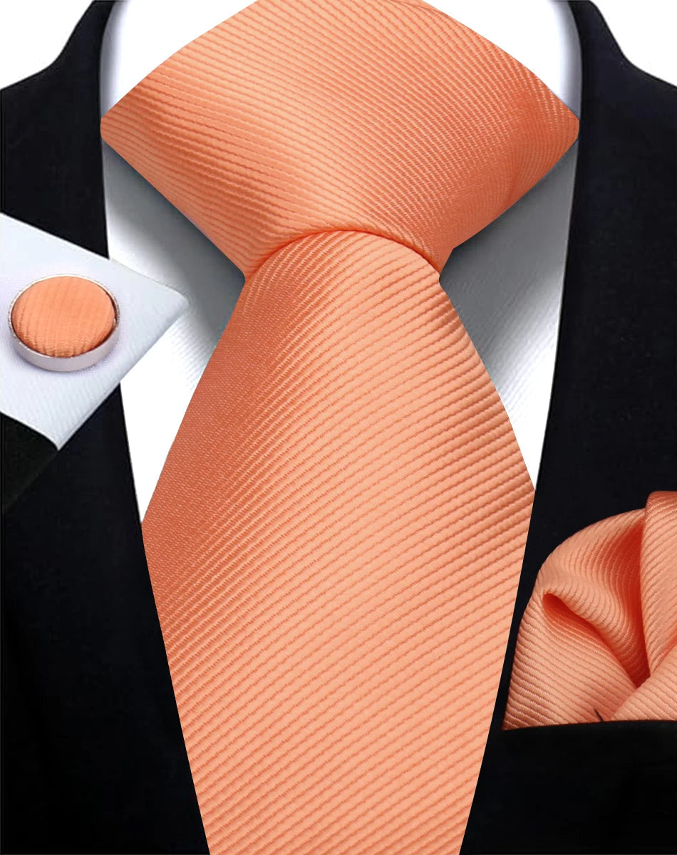 Cravate homme formelle, couleur unie, accompagnée de boutons de manchette pour occasions spéciales.